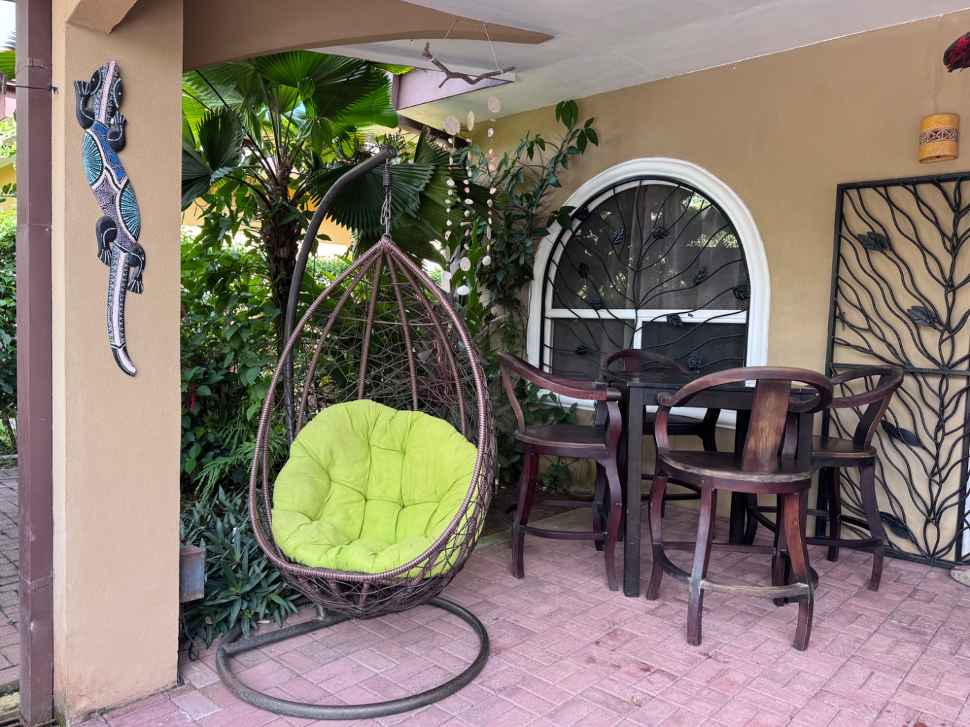 Hanging egg chair on the covered patio